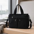Bolso tote de pana negro con cremalleras, doble asa y correa ajustable