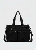 Bolso tote de pana negro con compartimento amplio y cremallera, asas y correa ajustable