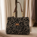 Bolso de cuero sintético con estampado leopardo, asa doble y placa marrón al frente