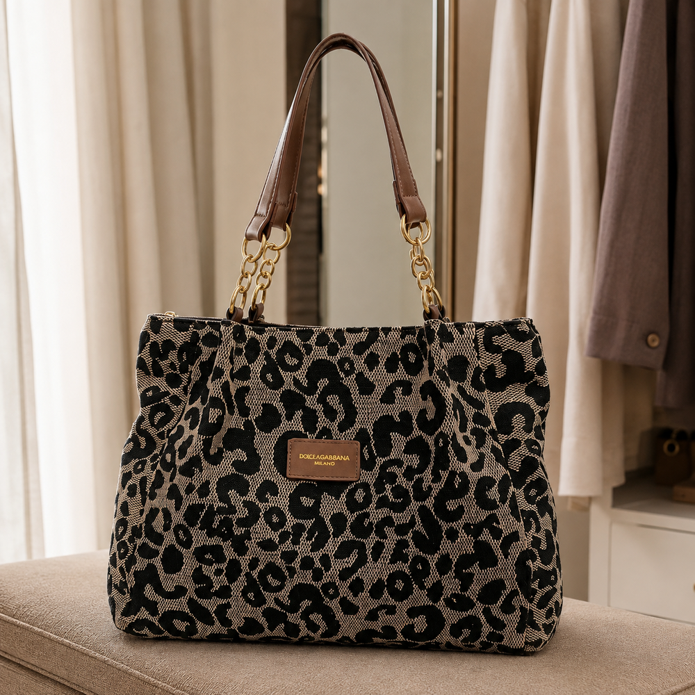 Bolso de cuero sintético con estampado leopardo, asa doble y placa marrón al frente