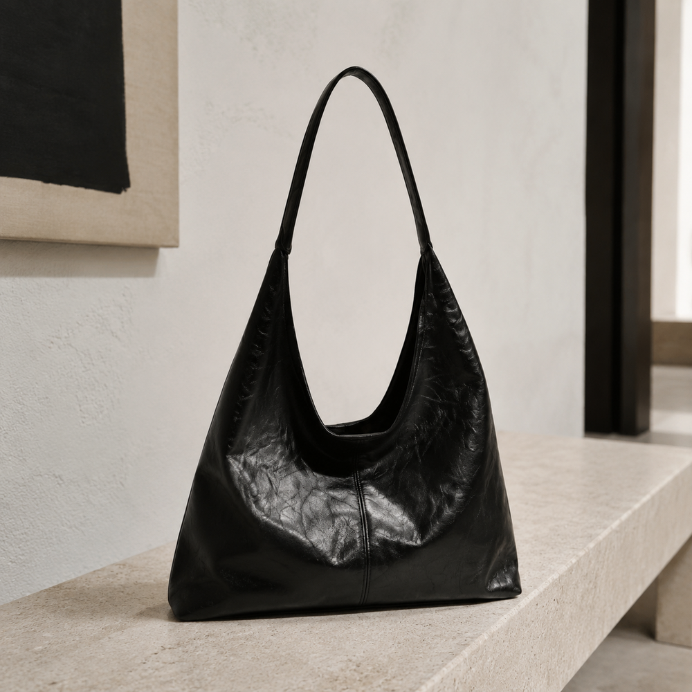 Bolso de cuero sintético negro con cremallera y asas tipo bandolera