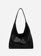 Bolso de cuero sintético negro tipo hobo con asa y silueta espaciosa
