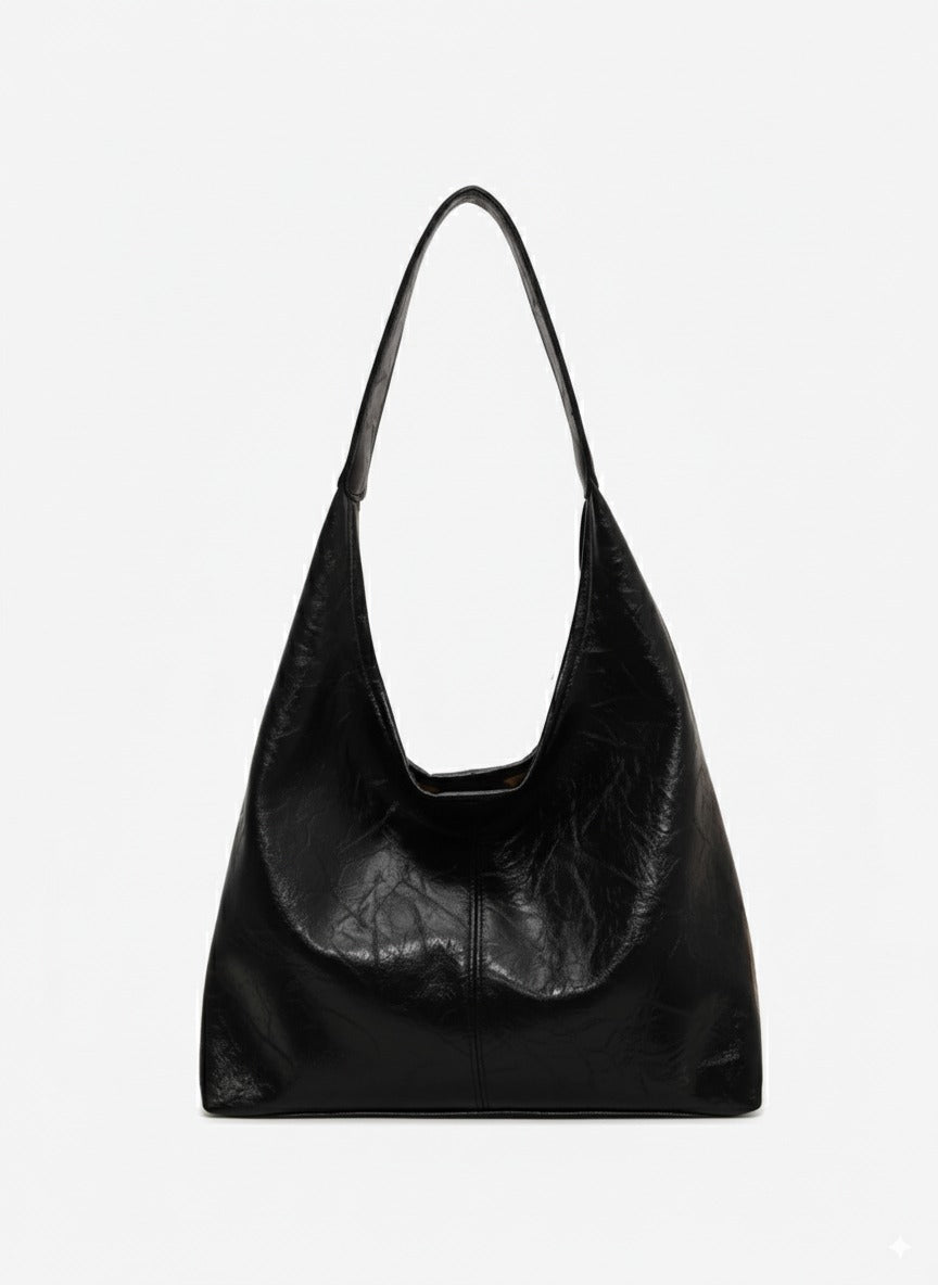 Bolso de cuero sintético negro tipo hobo con asa y silueta espaciosa