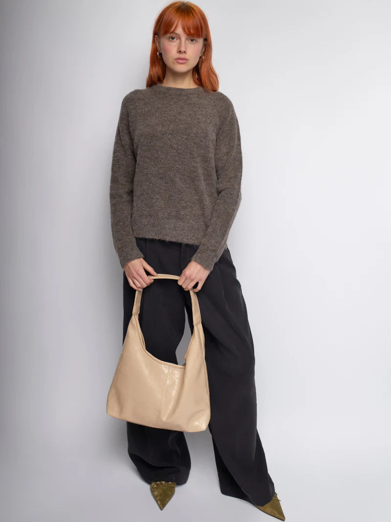 Bolso de cuero sintético beige tipo hobo con asa corta