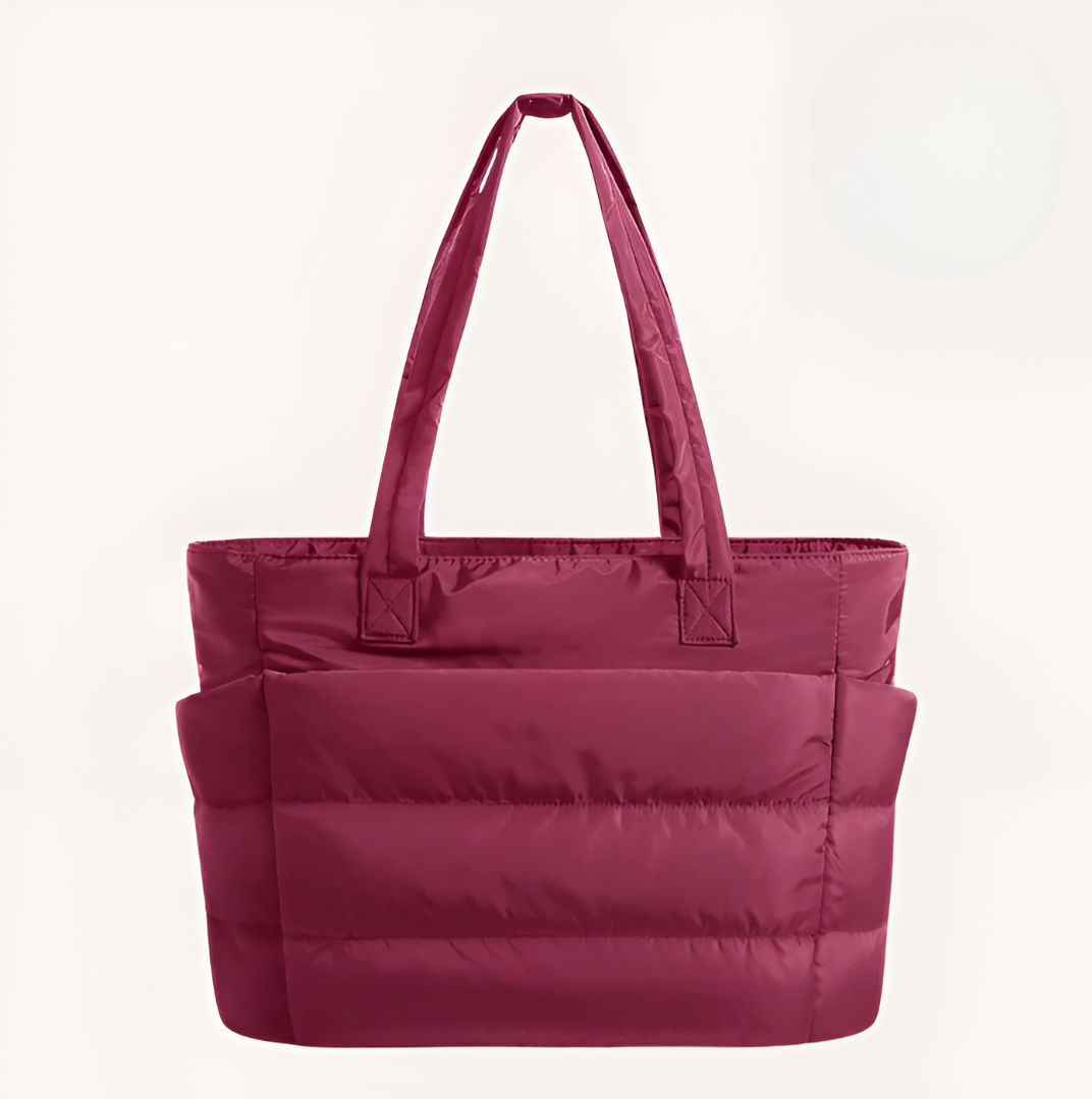 Bolso acolchado de hombro color fucsia, con asas largas y bolsillos laterales