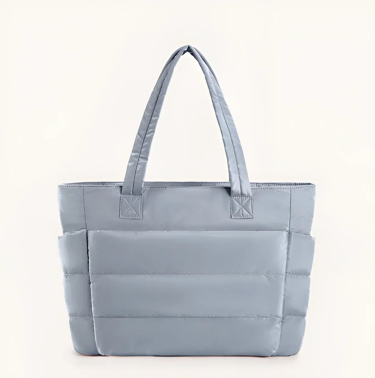 Bolso de hombro acolchado azul claro con asas largas