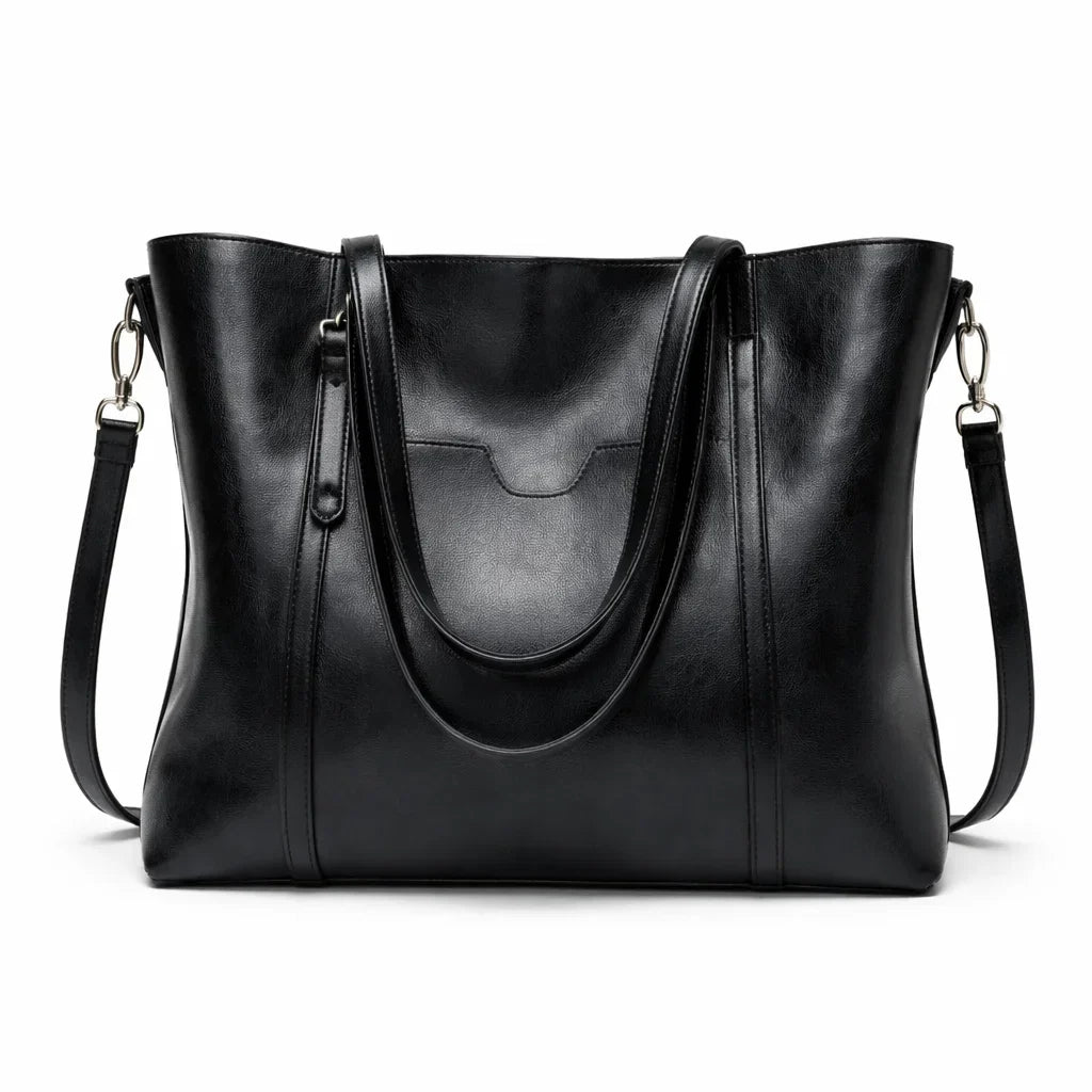 Bolso de hombro negro con doble asa, bandolera extraíble y bolsillo frontal
