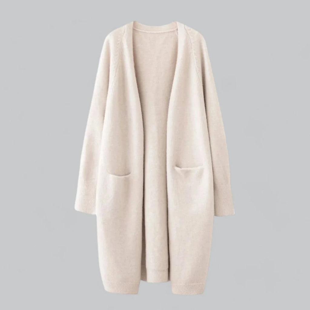 Cárdigan largo oversize color beige claro, abierto, con bolsillos delanteros
