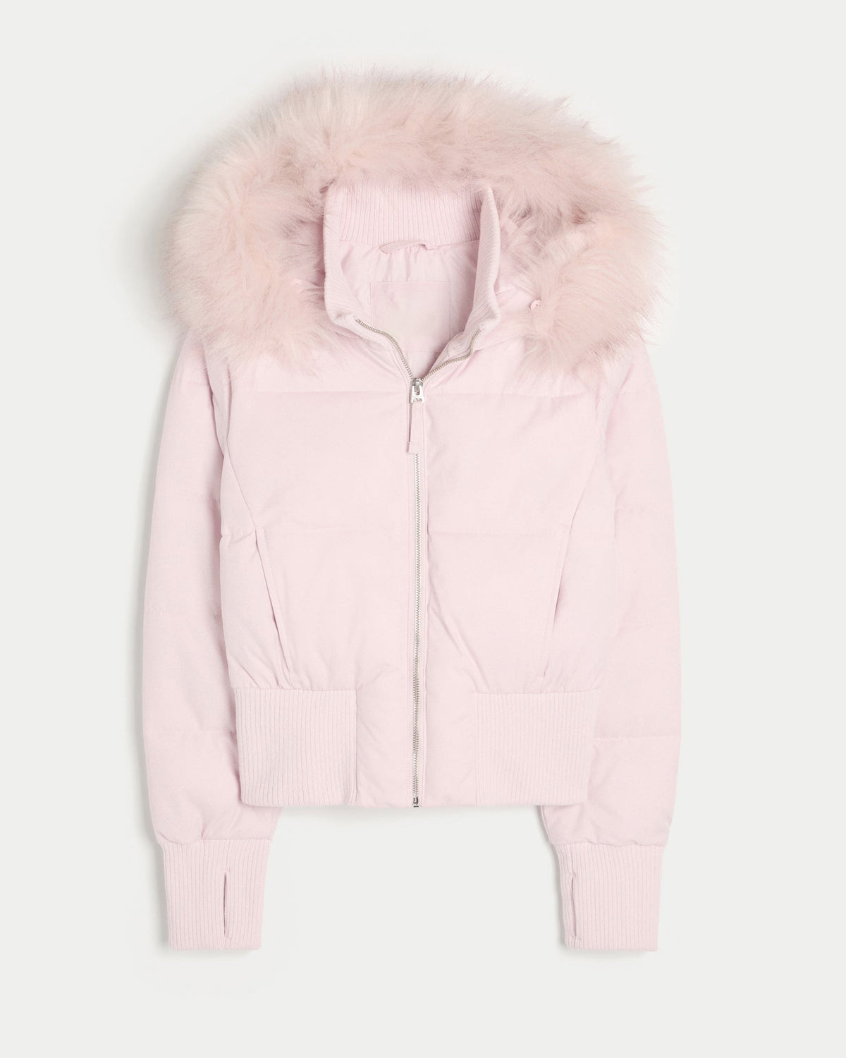 Chaqueta acolchada rosa claro con capucha de pelo y cierre de cremallera.