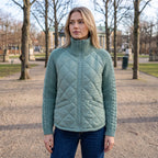 Chaqueta Híbrida Acolchada con Mangas de Punto Trenzado y Cuello Alto 6