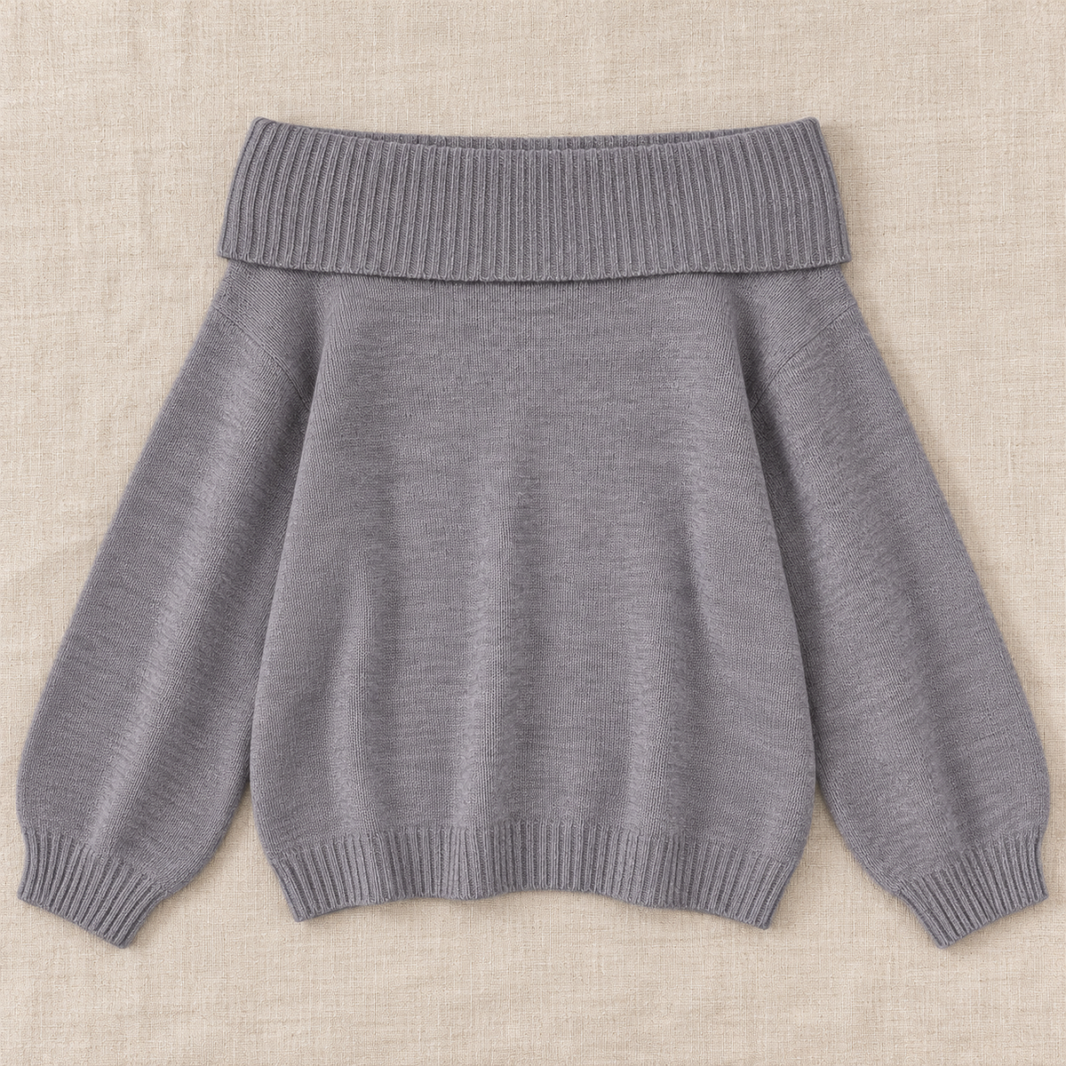 Jersey gris holgado de punto, con cuello ancho acanalado y mangas largas