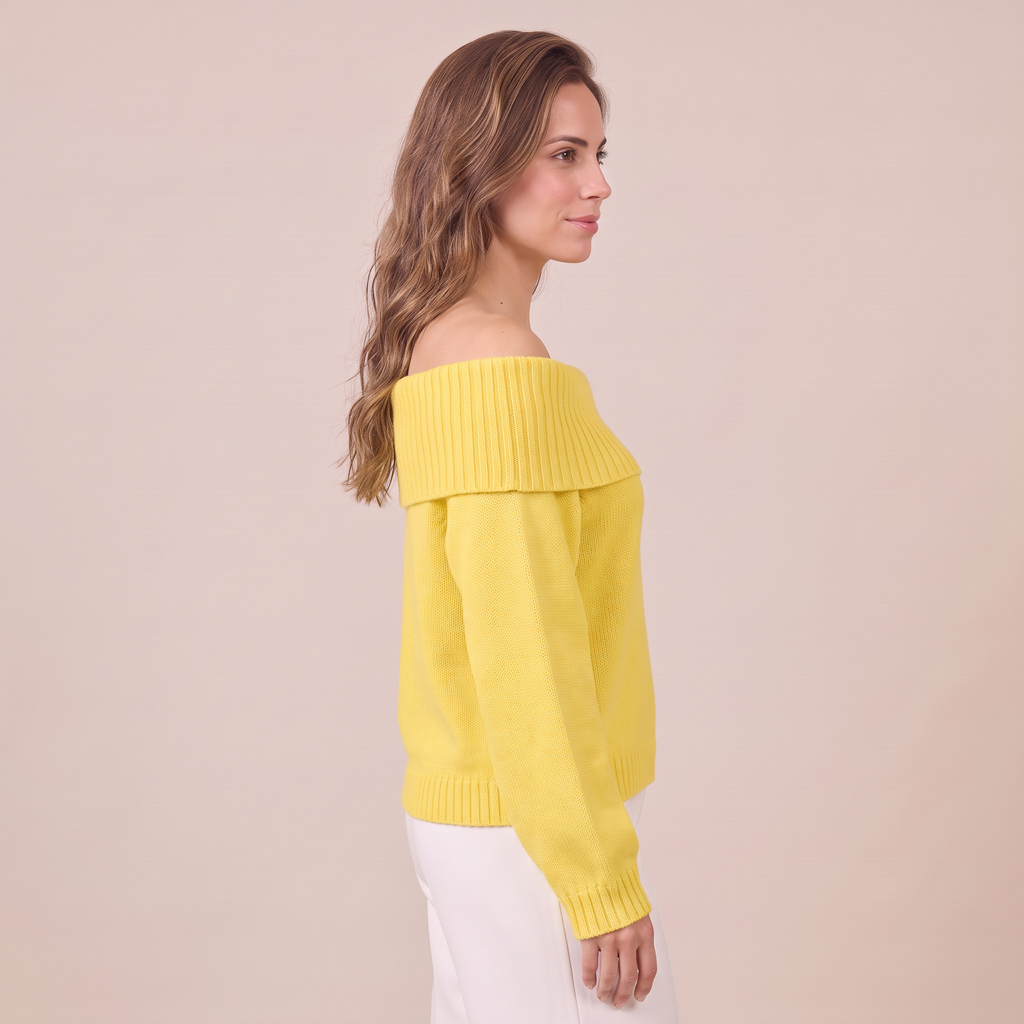 Jersey amarillo de perfil, con cuello ancho caído y mangas largas