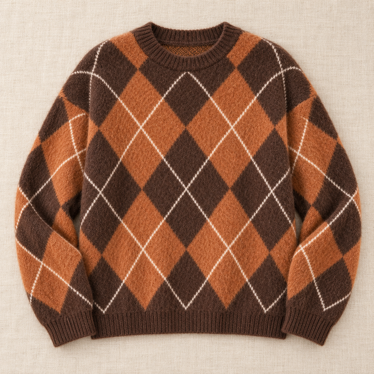 Jersey de punto con rombos marrones y terracota y líneas claras, vista frontal