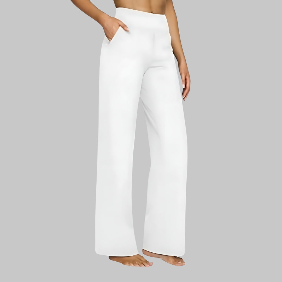 Pantalón elástico de tela ligera color blanco, pierna recta y tiro alto