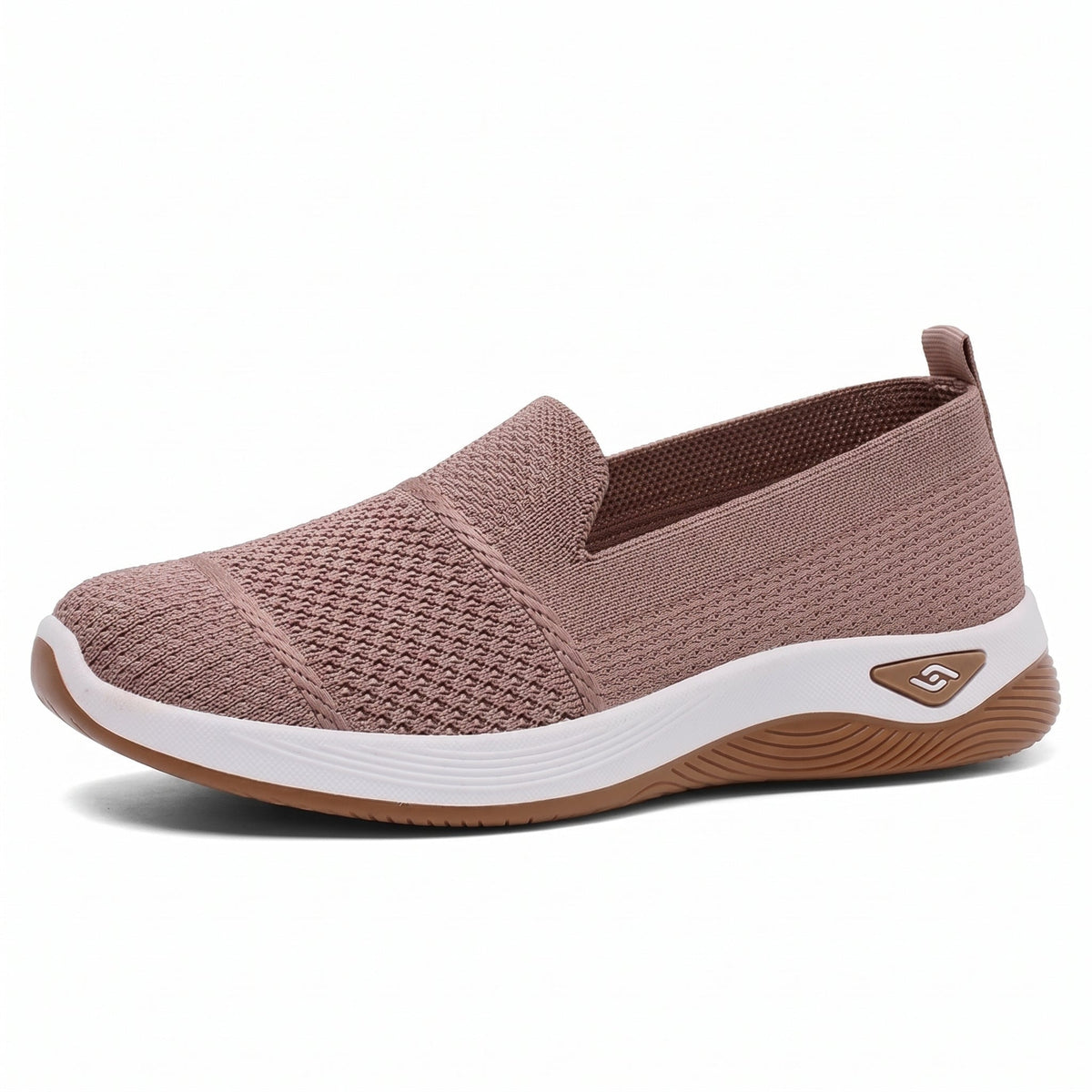 Zapatillas rosa sin cordones con paneles elásticos y suela blanca