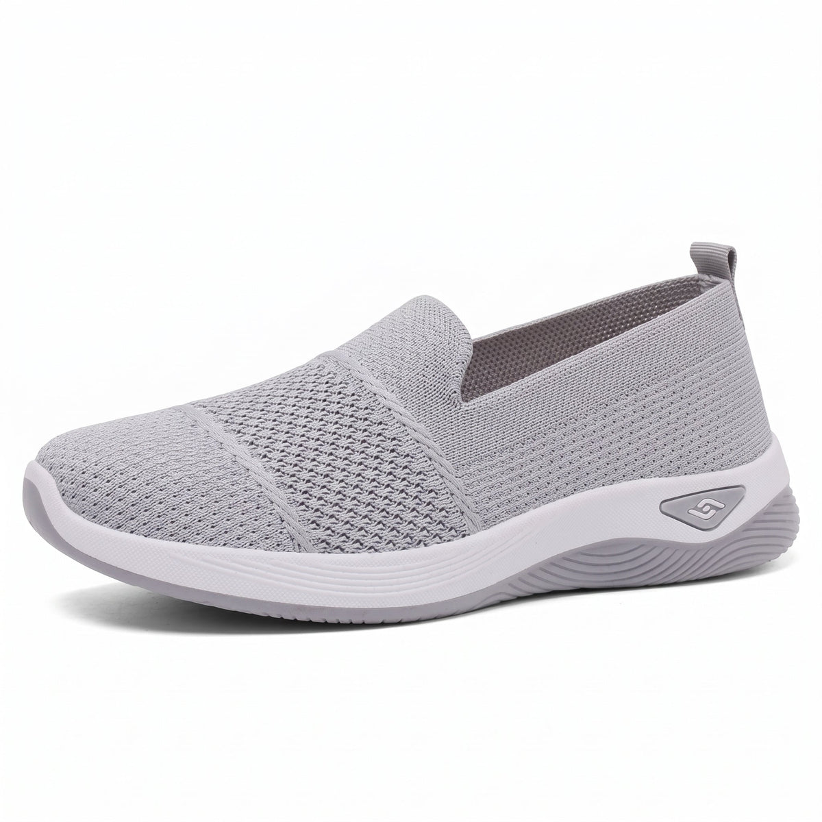 Zapatilla ligera sin cordones con panel elástico, tejido gris y suela blanca