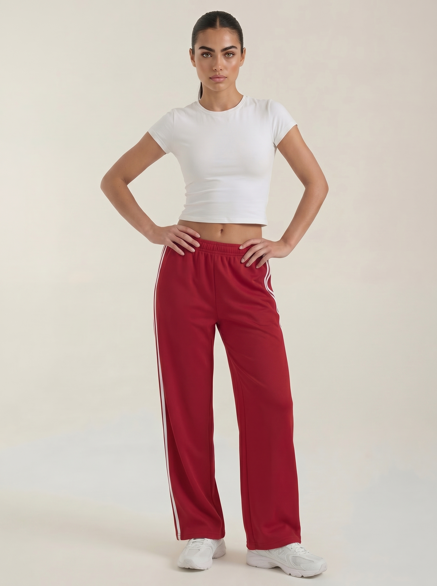 Bordeauxrode wijde joggerbroek voor dames met zijstrepen, elastische taille en trekkoord